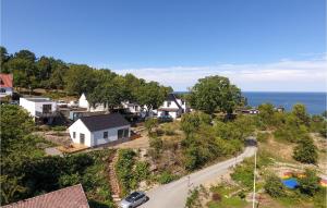an aerial view of a small town with the ocean at Beautiful Apartment In Allinge With House Sea View in Allinge