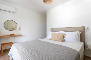 Кровать или кровати в номере SUNSET220 spetses