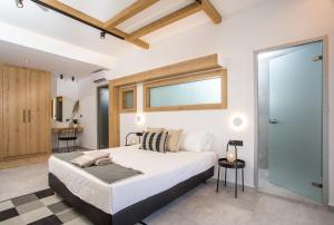 Posteľ alebo postele v izbe v ubytovaní Cactus Suites