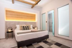 Posteľ alebo postele v izbe v ubytovaní Cactus Suites