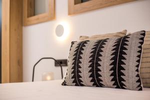 Posteľ alebo postele v izbe v ubytovaní Cactus Suites