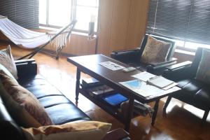 Posezení v ubytování ゲストハウスさくら Guesthouse Sakura