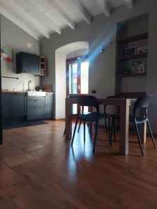Kuchyň nebo kuchyňský kout v ubytování Loft Centro storico + 11 fotografií