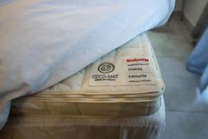 a close up of a mattress on a bed at Celestina Corfu Town Apartment in Corfu