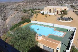The swimming pool at or close to Oasis Montana peace in Tabernas Desert