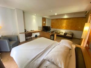 Postel nebo postele na pokoji v ubytování Liberta Hotel Jimbaran