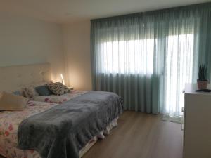 Posteľ alebo postele v izbe v ubytovaní Apartamento con estupendas vistas