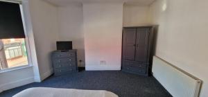 Postel nebo postele na pokoji v ubytování APARTMENT in CENTRAL DONCASTER
