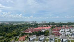 an aerial view of a city with houses at AJ Family Work Sandakan Homestay Blue Horizon in Sandakan