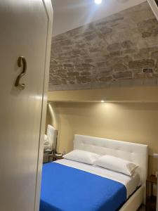 A bed or beds in a room at Solo Vip