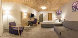 Postel nebo postele na pokoji v ubytování KOSIS Sports Lifestyle Hotel