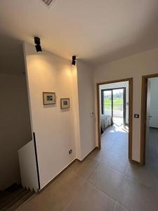 Fotografia z galérie ubytovania Logement neuf-Ghisonaccia centre, à 5min de la Mer v destinácii Ghisonaccia