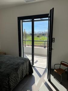 Posteľ alebo postele v izbe v ubytovaní Logement neuf-Ghisonaccia centre, à 5min de la Mer
