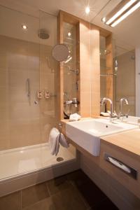 Koupelna v ubytování H+ Hotel Salzburg