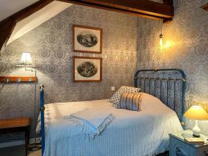Posteľ alebo postele v izbe v ubytovaní La Souveraine - Cottage - Château Le Bas Bleu
