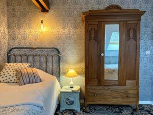 Posteľ alebo postele v izbe v ubytovaní La Souveraine - Cottage - Château Le Bas Bleu