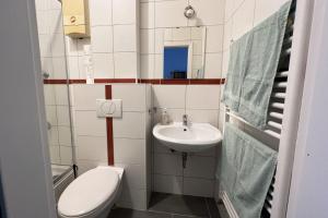 Ένα μπάνιο στο work & stay apartment