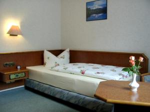 Postel nebo postele na pokoji v ubytování Hotel Plovdiv