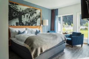 Postel nebo postele na pokoji v ubytování Valldal Fjordhotell - by Classic Norway Hotels