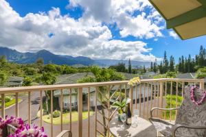 a balcony with a view of the mountains at Nohea Villa in Princeville