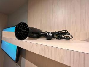 a black wii remote sitting on top of a counter at Reka Hotel Genting Highlands in Genting Highlands