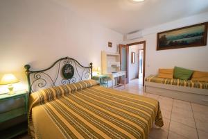 A bed or beds in a room at Villetta Grazia