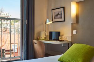 Postel nebo postele na pokoji v ubytování Campanile Hotel Nice Centre Acropolis
