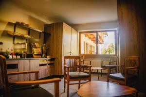 A kitchen or kitchenette at Dolomitenhotel Weisslahnbad