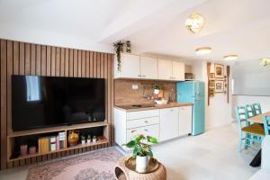 Kuchyň nebo kuchyňský kout v ubytování Selamare Apartment by Locap Group
