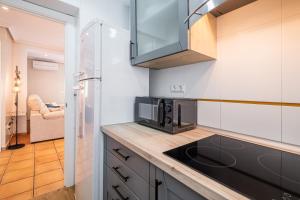 Kuchnia lub aneks kuchenny w obiekcie Penthouse Ancla 562 Levante Beach