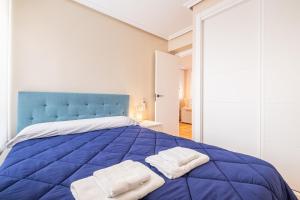 Łóżko lub łóżka w pokoju w obiekcie Penthouse Ancla 562 Levante Beach
