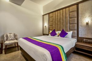 Katil atau katil-katil dalam bilik di Treebo Premium Savera Inn