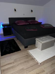 Posteľ alebo postele v izbe v ubytovaní UNA