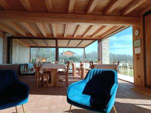 a dining room with a table and chairs at Agriturismo Dolce Colle in Volpago del Montello