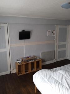TV a/nebo společenská místnost v ubytování Auberge Gordonienne