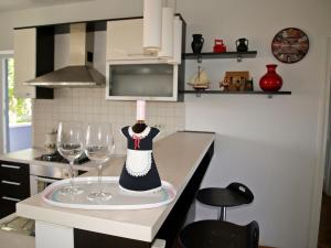 Kuchyňa alebo kuchynka v ubytovaní Apartment Roxy