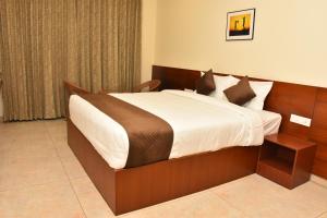 Voodi või voodid majutusasutuse CLIFFVIEW RESORT toas