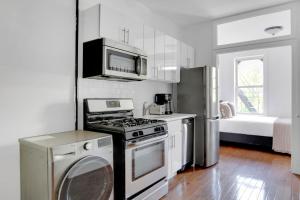 Gallery image of Sunlit LES 1BR w WD nr BD train NYC-865 in New York