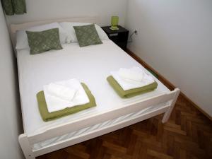 Posteľ alebo postele v izbe v ubytovaní Apartment Roxy