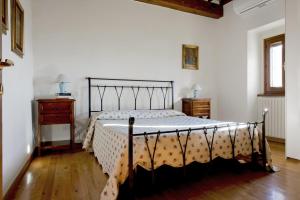 Postel nebo postele na pokoji v ubytování Agriturismo Il Castelluccio