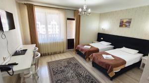 Postel nebo postele na pokoji v ubytování Diamond Resort White