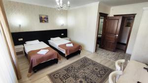Postel nebo postele na pokoji v ubytování Diamond Resort White
