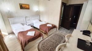 Postel nebo postele na pokoji v ubytování Diamond Resort White