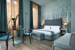 Postel nebo postele na pokoji v ubytování Villa Appiani Hotel