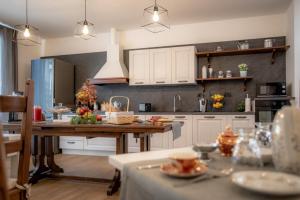Kuchyň nebo kuchyňský kout v ubytování B&B Quattro Stagioni Charme and Wellness
