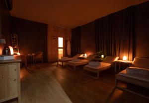 Postel nebo postele na pokoji v ubytování B&B Quattro Stagioni Charme and Wellness