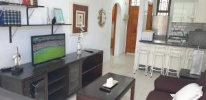 TV a/nebo společenská místnost v ubytování Garajonay II, Los Cristianos