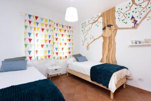 Krevet ili kreveti u jedinici u okviru objekta Home2Book Stunning Sea View Santa Úrsula
