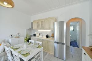 Η κουζίνα ή μικρή κουζίνα στο Olivo II Luxury Apartment +22 φωτογραφίες