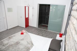 Llit o llits en una habitació de Apartments & Room Dijana